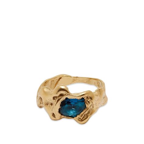 Simuero. OLA BLUE. Ola Blue, handmade recycled silver ring with blue Topaz Cz stone. La Costa Collection. Handcrafted in Valencia, Spain. 2-5 working days. 15-day size exchange. 2-year warranty. 925 Recycled Sterling Silver. 