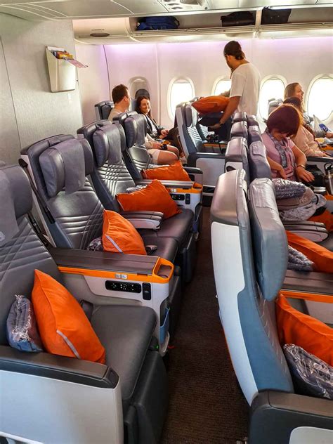 Singapore airlines premium economy. Key Takeaways. Economy class provides reasonable seats, meals and in-flight entertainment. Premium Economy offers extra space, storage, charging options. … 