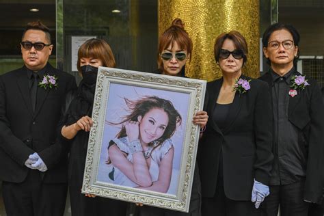 Singer Coco Lee mourned by fans and family at Hong Kong funeral
