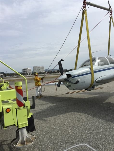 Single-engine plane belly lands at Centennial Airport