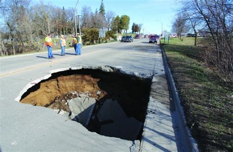 Sinkhole strain. It is concluded that by including the small strain soil behavior via the intergranular strain concept, a more realistic representation of sinkhole-induced geotechnical response is provided in terms of maximum ground surface settlements, distortions, and sinkhole influence zones than the corresponding simulations conducted using basic ... 
