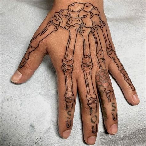 Skeleton hand tattoo outline. Things To Know About Skeleton hand tattoo outline. 