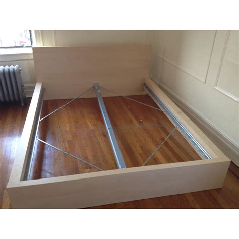 Skorva ikea. Not sure if you've built your bed already and took a look at it, but the LUROY (and any other slats/boxspring you'd use, for that matter) rests on top of the two side rails and is supported down the centerline by the SKORVA beam. Theoretically any slats or boxspring that can reach both rails in width can support your mattress as the load ... 