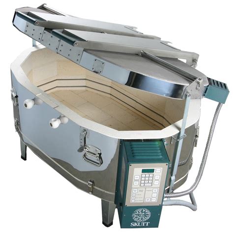 Skutt - The KM1027 has everything most potters need in a kiln. The chamber size is tall enough to fire a 23″ tall pot and wide enough to hold a 21″ platter. It comes standard with the smartest controller on the market (it will even calculate your cost of firing) and has a lid lifter to boot! Click on the tabs above to find out more. Features. Specs. 