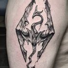 Skyrim tattoo done by Tyler Nguyen out of My Little Needle Tattoos