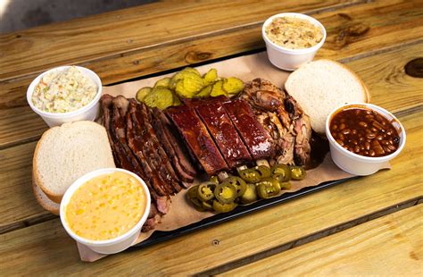 Slaps bbq kansas. Updated June 23, 2022 2:24 PM. A sampler platter from Slap’s BBQ. Gay Jones Special to The Star. Eater, a food news and dining guide website, has published “The 14 Best Barbecue Joints in ... 