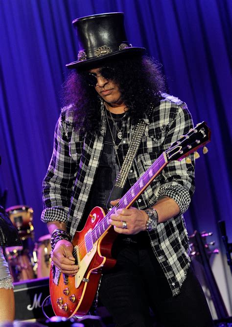 Slash guitarist. As one of the most recognizable guitar players of the past 30 years, in both appearance and sound, Slash's unique presence and playing has made him a force to be reckoned with—especially when soloing. Get your lighters ready because these tracks feature some of the most famous, epic, and impressive solos from the axeman's career. 