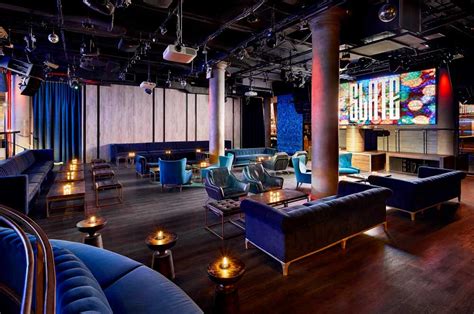 Slate nyc. Slate NY is a bar that will make you feel like. a kid again. The slide takes you from the top floor down to a floor full of fun activities, including: Mini Bowling. Giant Jenga & Ping Pong. There ... 