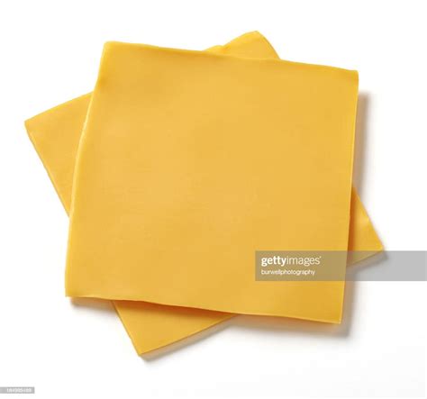 Slice of american cheese. Oct 24, 2023 · Kraft singles. A process cheese, with a minimum of 51% cheese, a moisture content between 44 and 60%, and a milk fat content of at least 20%, that remains spreadable at 70°F (21°C). Block cheeses intended for macaroni and cheese, like Velveeta; cheese spreads, like Alouette or Laughing Cow; Cheez Whiz; Easy Cheese. 