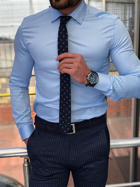 Slim fit dress shirt. There are only a handful of days you’ll remember all your life. Your wedding day is one of them so you’ll want to look your best. The raised waistline on this gown defines this dre... 