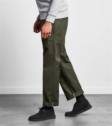 Slim fit work pants. Baggy vs. relaxed vs. slim-fit pants Back in the 1960s and 1970s, polyester pants started fitting pretty tight and showed off the physique of the man wearing them. Then in the 1980s, denim ... 