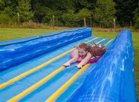 32' Double Lane Slip and Slide. All rentals are overnight. $275 w/FREE DELIVERY in town. RENT IT! 32' Double Lane Slip and Slide. All rentals are overnight. $275 w/FREE DELIVERY in town. RENT IT! Dunking Booth/Dunk Tank. All rentals are overnight. $225 w/FREE DELIVERY in town. RENT IT! Primary Bounce House. …