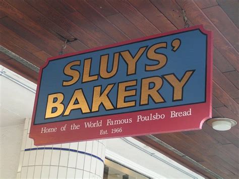 Sluys bakery. October 28, 2009 Kitsap, Poulsbo Cakes, Cookies, Downtown Poulsbo WA, Fruitcakes, Lefse, Nordic Bakery, Nordic sweets, Pastries, Poulsbo, Poulsbo Bread, Poulsbo Wa, Seasonal Desserts, Sluys Bakery. Sluys Bakery in historic downtown Poulsbo WA and the home of the famous Poulsbo bread. The window display is absolutely enticing and will … 