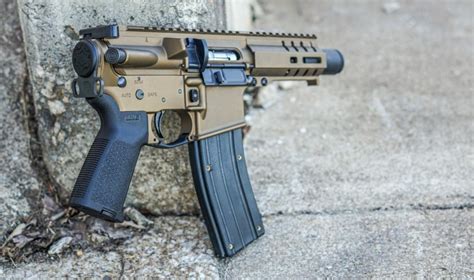 The Springfield Armory Edge Evac is a takedown AR pistol that can be quickly disassembled and stored in a small backpack or case. The pistol features a 5.5-inch barrel with a blast diverter, a Law Tactical Gen 3-M folding adapter, an SB Tactical SBA3 brace, and an M-LOK handguard.