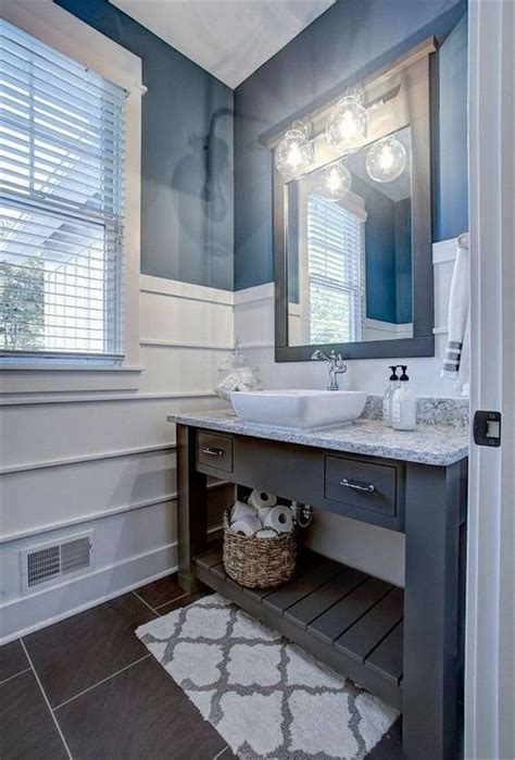 Small bathroom renovation. Classic Powder Bathroom Remodel Karr Bick Kitchen and Bath Small transitional travertine floor and beige floor bathroom photo in St Louis with flat-panel cabinets, gray cabinets, a two-piece toilet, gray walls, an undermount sink, marble countertops and multicolored countertops 