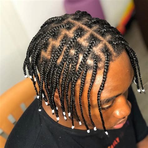 Small mens braids. It includes three big elements of hairstyles: Strands, Zig-Zag design, and Buns. Even the zig-zags are going in both vertical and horizontal directions for this incredible White Men’s Braids style. First, the head is sectioned into two parts. The front section has four medium cornrow braids hanging freely. 