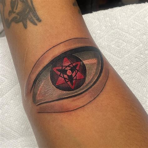 of 11. Find Sharingan stock images in HD and millions of other royalty-free stock photos, illustrations and vectors in the Shutterstock collection. Thousands of new, high-quality pictures added every day.. Small sharingan tattoo