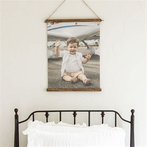 Smallwood frames. Product Specifications : Crisp, high-resolution photo printed on a poly cotton blend, woven canvas material . Each print is wrapped around a handcrafted, wooden frame designed to hang in any space . Arrives ready to display with hanging hardware pre-installed on the back of the sign . Our custom wrapped canvas signs fit anywhere you find a good ... 