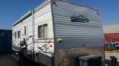 2015 Haulmark Passport, Stop out and take a look at this New 2015 Haulmark 8.5x24 Passport Enclosed Trailer! This trailer features a side entry door 24'' stone guard 2-forced air side vents 4' beavertail D-rings in the floor rear ramp door radial tires .030 Aluminum Siding 5200lb axles one piece aluminum roof 16'' on center walls 3/8'' Drymax walls 3/4'' …. 