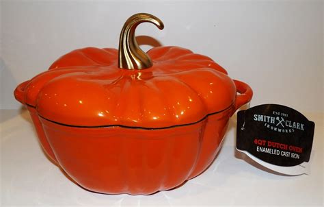 Smith and clark pumpkin dutch oven. Decorate your kitchen for the autumn season with this charming black pumpkin Dutch oven from Smith Clark Ironworks. Crafted with high-quality enameled cast iron for exceptional cooking performance, this 4-quart Dutch oven features a delightful design that adds fall flair to your stovetop and kitchen table. Product Type: Dutch oven 