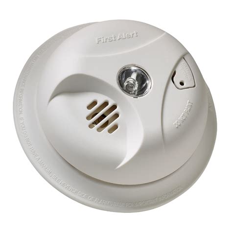 Smoke alarm operates on a 120V wired power source with a 9-Volt alkaline battery backup ; An 85-decibel alarm sounds & a red LED indicates the smoke detector is sensing smoke or fire ; Test-Hush button makes it easy to test the smoke detector and silence false alarms that occur from cooking or shower steam ;. 