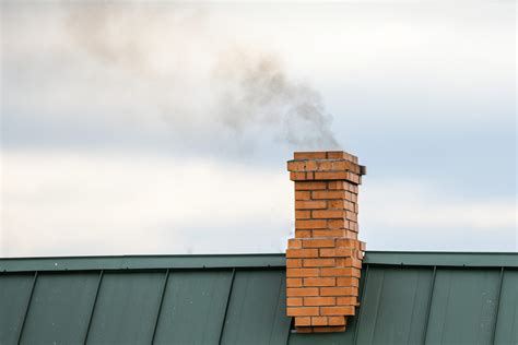 Smoke coming out of chimney but no fire.  Sounded like a roaring fire.  ...