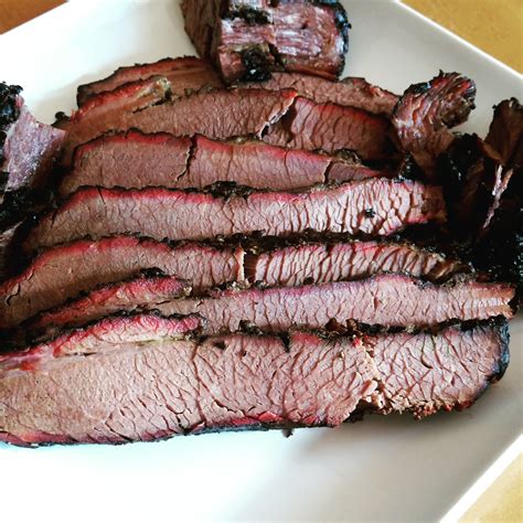 Smoked beef brisket. Jul 27, 2022 · To get the brisket to continue cooking to the desired temperature of 203 degrees F, transfer the brisket to a rimmed baking sheet or cutting board then wrap the meat completely in aluminum foil or ... 