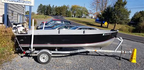 Smokercraft - This 2017 Smokercraft 15' Alaskan S/C is new, This is a great fishing boat that comes with side console controls, Two box seats, carry handles, bow cap, bench seating, Rod storage grippers, and more. This boat sits atop a E-Z Loader EZ 12-14 1000# Galvanized Trailer. This boat and trailer is on sale for only $4,881.