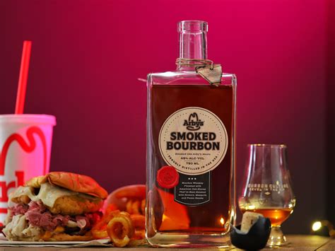 Smoky bourbon. A shot of bourbon contains approximately 100 calories, when it is 40 percent alcohol and 80 proof. However, the exact calorie count may depend on the specific brand. A single shot ... 