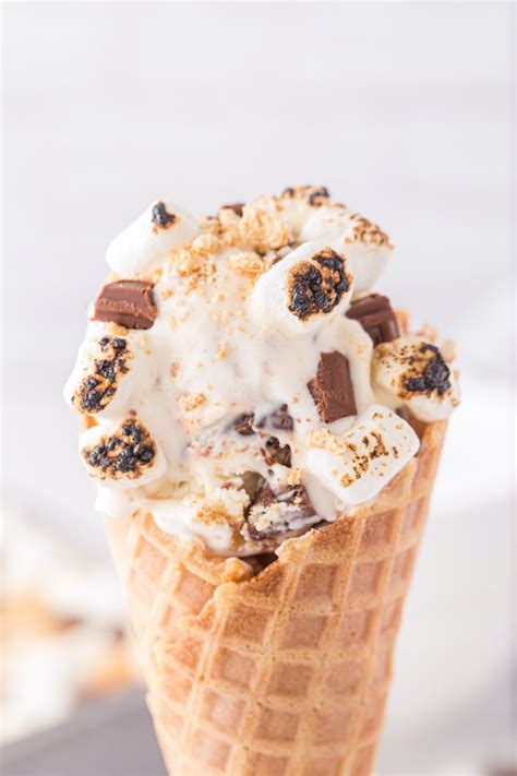 Smores ice cream. Pour into a 9x5” loaf pan. The mixture will be fluffy and should fill the pan completely. Sprinkle the remaining graham crackers, marshmallows, and chocolate on top. Cover and place inside the freezer for 6 hours or overnight. When chill time is complete, remove from the freezer and serve ice cream with a waffle cone or bowl. 