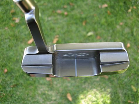 Snake eyes putter. Canada. The Wilson Staff Infinite putter line includes six classic head shapes with refined detailing, each featuring counter-balanced technology for a more controlled putting stroke. Inspired by the company's headquarters in Chicago, each putter is named after a local landmark or neighborhood. The NEW 2018 line features. 