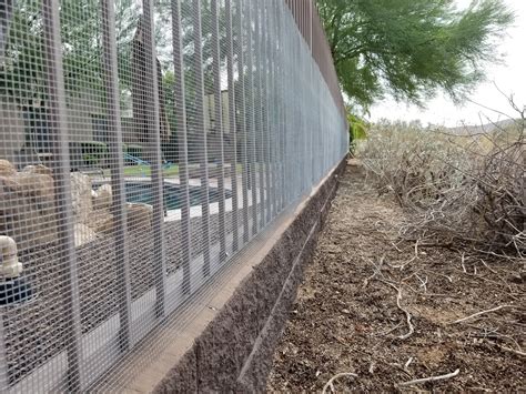 Snake proof fence. Install snake barriers: To further discourage snakes from entering your yard, consider installing snake barriers. These can be physical barriers like snake-proof fencing or natural deterrents like cedar wood chips or mothballs. Consult with professionals to determine the most suitable option for your specific situation. 
