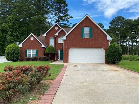 5 beds 2.5 baths 3,972 sq ft 1.03 acres (lot) 2851 Riverfront Dr, Snellville, GA 30039. Waterfront Home for sale in Snellville, GA: Discover your Elegant Executive Estate! This 4-sided brick home sits on a 1-acre wooded lot with a creek. It features 6 bedrooms (or 5 plus a den) with a master suite on the main. 
