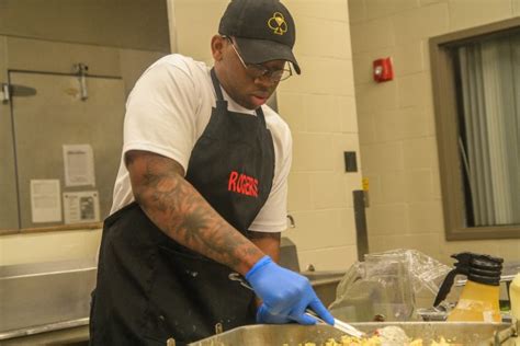 Download Image of Pfc. Bernard Jackson, culinary specialist, Forward. Free for commercial use, no attribution required. Pfc. Bernard Jackson, culinary specialist, Forward Support Company, 1st Squadron, 32nd Cavalry, 1st Brigade Combat Team “Bastogne”, 101st Airborne Division preparing sweet potatoes for the lunch meal served on April 2 in the Snipes Dining Facility on Fort Campbell, Kentucky.. 