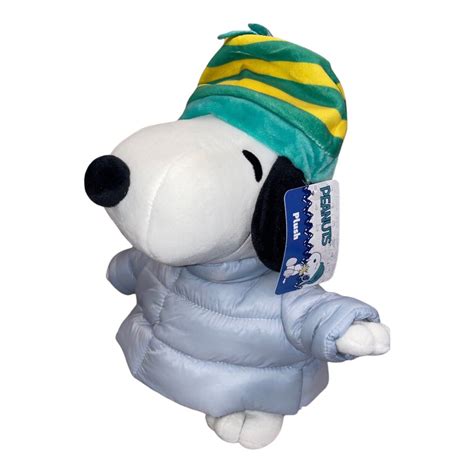 And now, there’s a new version of Snoopy in a puffer jacket that is being sold — and sold out — in CVS stores across the country. Gen Z and TikTok are fueling the doll’s virality, because they can’t get enough of his cuteness. Snoopy’s look in this is simple. Snoopy is wearing a gray-blue puffer jacket with a green and yellow .... Snoopy puffer jacket cvs