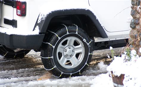 Beware that the clearance issues with the front are true. If you look behind your front wheel, the suspension only gaps the tires in the front by about .5". Your 4x4 will be fine with good tires in 95% of snow conditions, and rear chains will allow your truck to tackle 99% of snow conditions. dvcobra427, Dec 8, 2016.. 
