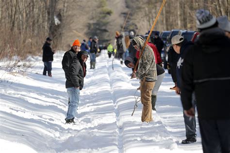 Snowsnake - Snow snake is a game where players throw polished sticks along curved snow tracks for distance and accuracy. Learn about its history, rules, and how to play it in Madison, Wisconsin.