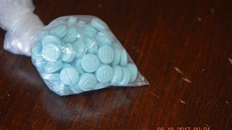 SoCal men helped sell 124K fentanyl pills on darknet, DOJ says