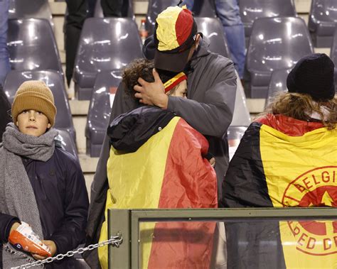 Soccer match between Belgium and Sweden suspended after a gunman kills 2 Swedes in Brussels