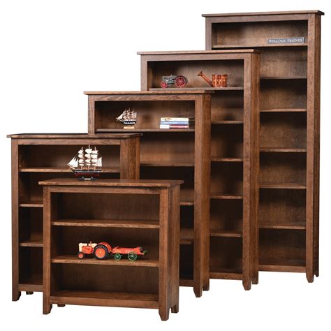 Solid wood book shelf. Treviso Oak Low Bookcase Approx Dimensions: W: 85 D: 35 H: 105cm Product Description The Treviso Oak Low Bookcase offers an elegant blend of modern and contemporary design. Featuring curved edges and legs combined with dovetailed joints, the unit delivers a strong visual statement. Its unique curved finish and choice of metal and wood handles... 