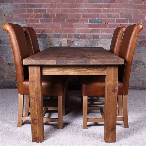 Solid wood dining table. Round Dining Table, Live Edge Wood Dining Table, Round Gold Epoxy Dining Table Top and Legs, Small Live Edge Solid Wood Rustic Dining Table. (208) $449.00. FREE shipping. Reclaimed Distressed Round Dining Table. Heavy Duty Iron Pipe legs. Choose size and height. (2.2k) $230.94. 