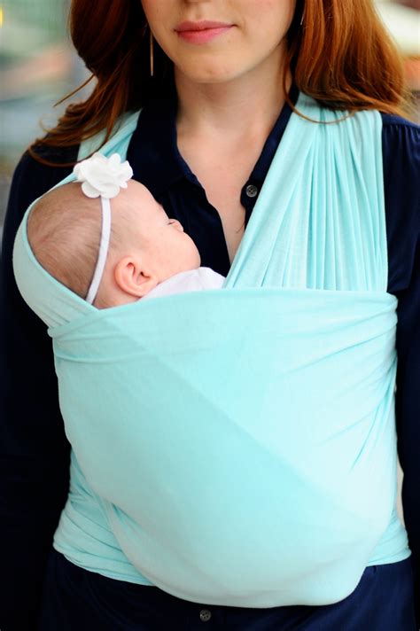 Solly baby wrap. The Solly baby wrap is great because you can adjust as you need and it holds baby very snug. We started baby wearing around 2 months and although she wasn't a … 