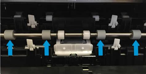 Solved: Black roller marks on paper - HP Support Community