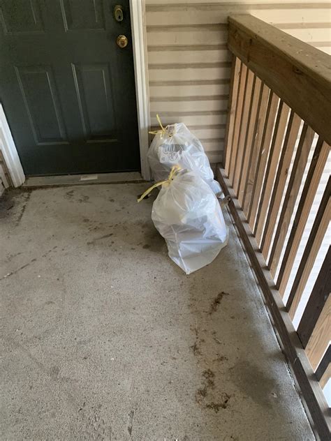 Some asshole neighbor leaves full garbage bag on my apartment door