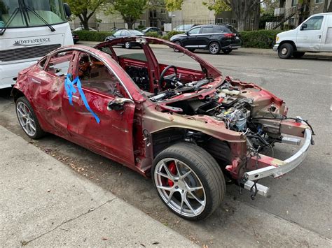 Someone Is Selling This Trashed But Drivable Tesla Model 3 CarBuzz