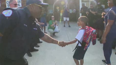 Son of fallen CFD firefighter dropped off in firetruck on first day of school