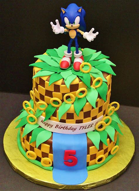 Sonic sonic cake. Allergens. Cake Dimensions. Let the excitement of Sonic's world come to life with a slice of our Sonic-themed delight! Inspired by the high-speed adventures of the iconic video game character, showcasing a burst of vibrant colours, this cake is the perfect centrepiece for gamers and fans alike. Scroll down to see … 