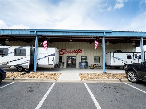 Sonny's Camp-N-Travel is a dependable RV dealership with locations in South Carolina. They proudly serve the Concord, NC area. They offer an extensive line of both new and used RVs and specialize in rigs from Coachmen, Grand Design and Highland Ridge. Here, you'll find low-priced Class C, Fifth Wheel and Travel Trailer units. 