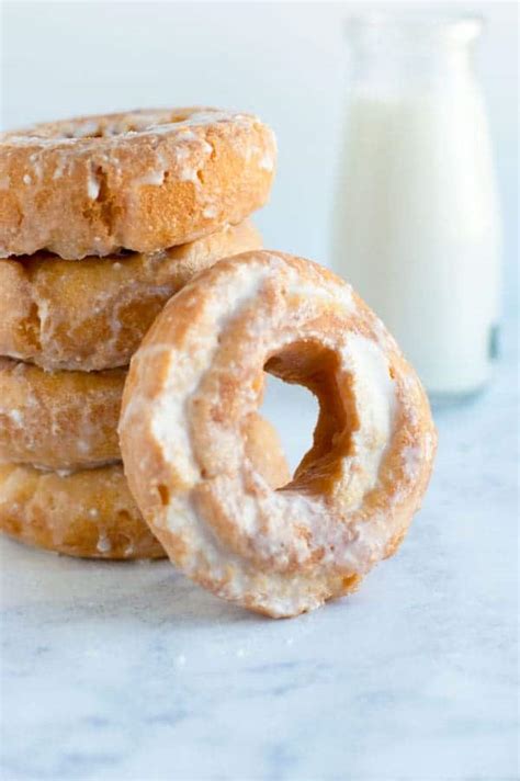 Sour cream doughnut. directions. Add sugar, sour cream, and milk to eggs and beat thoroughly. Sift dry ingredients together several times. Add orange rind. Stir into egg mixture to make donut batter. Drop batter into hot oil. Flip over when bottom side is brown. Remove from oil and drain on paper towels. Makes 2 dozen donuts. 