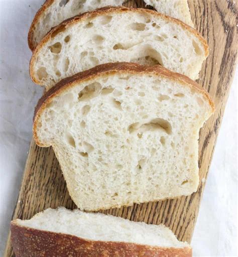 Sour dough sandwich bread. In a large mixing bowl, combine sourdough starter, water, and olive oil. Stir until combined. ⅔ cup (150 g) active starter, 1 ⅓ cups (315 g) warm, 1 ½ (18 g) Tablesoons olive oil. Add bread flour and sprinkle salt overtop. Use your (clean) hands or a wooden spoon to stir together until dough is mostly combined. 